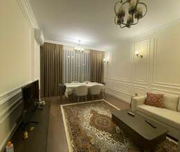 Bakıxanovda 2 otaqlı əla təmirli mənzil