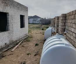 Buzovnada torpaq satilir