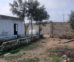 Buzovnada torpaq satilir