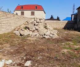 Buzovnada torpaq satilir