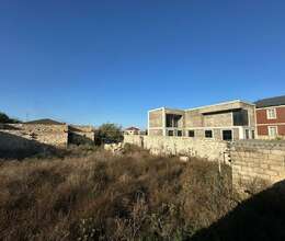 Buzovnada torpaq satilir