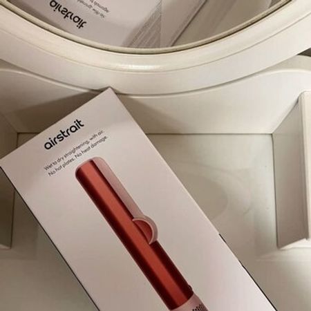 Dyson Airstrait Stravberry Bronze feni