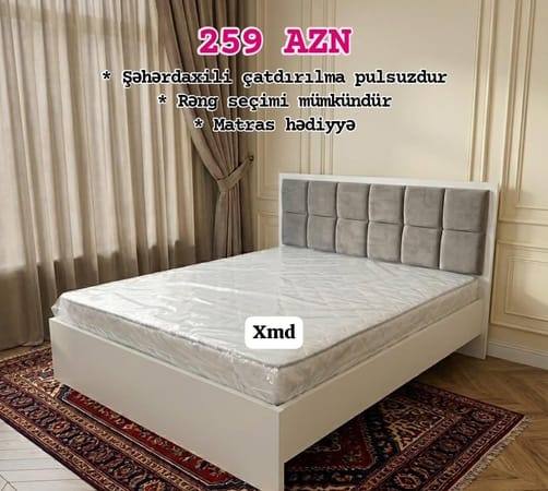 Taxt ikinəfərlik çarpayı